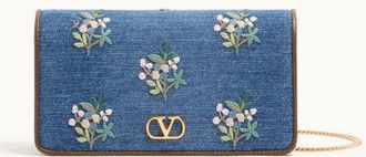 Valentino Garavani Mini borsa a tracolla Valentino Garavani VLogo Signature in denim con ricamo floreale Donna DENIM UNI