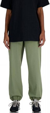 New Balance WomenS Athletics Stretch Woven Jogger Pants In Dark Olvine Green
