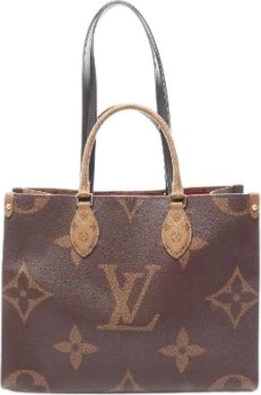 Louis Vuitton Pre-owned On The Go MM Monogram Giant Reverse Tote Bag - Dames - Vintage Shopper - Bruin - ONE Size - Leer - Vintage