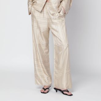 Toteme Pajama-style trousers in ivory monogram silk
