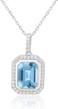 Suzy Levian Sterling Silver Emerald Cut Blue Topaz And White Topaz Pendant