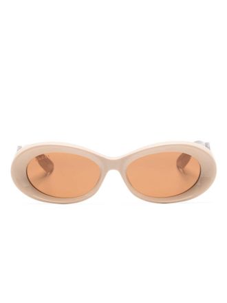 Gucci Zonnebril met ovaal montuur - Beige