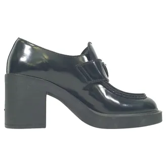 Prada Chocolate High-Heeled Loafers in Black Leather