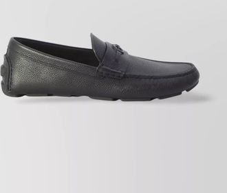 Gucci pebbled leather driver moccasins with visible stitching