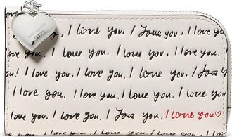 Kate Spade New York Devin I Love You Script Embossed Leather Small Slim Bifold Wallet Wallet Womens Handbags Cream