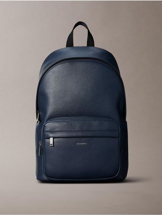 Calvin Klein Mens Raised Logo Round Backpack - Blue