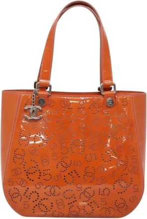 Chanel Pre-owned Tote Bags, female, Orange, Size: ONE SIZE Pre-owned Vintage Patent Leather Tote Bag with Perforated Logo