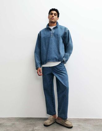 Asos Jeans affusolati comodi blu lavaggio medio con pieghe e fibbia