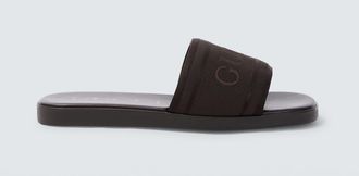 Gucci Logo canvas and leather slides