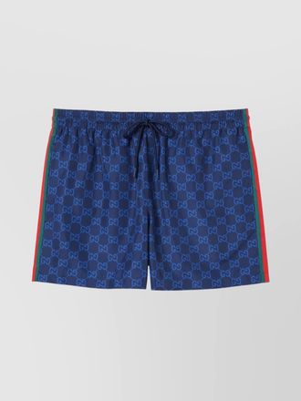 Gucci striped swim shorts with side and back pockets