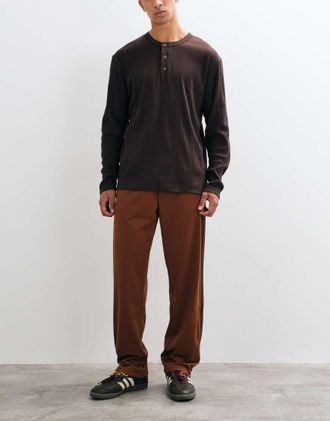 adidas Originals Firebird pantaloni della tuta arancione bruciato-Marrone