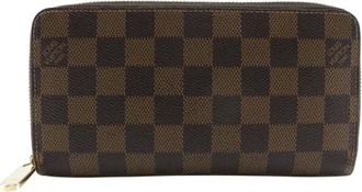 Louis Vuitton Pre-owned Zippy Wallet Damier Portemonnee - Heren - Vintage Accessoires - Bruin - ONE Size - Vintage