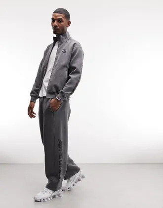 Aape By A Bathing Ape Aape by A Bathing Ape - Joggers a fondo ampio nero slavato in coordinato