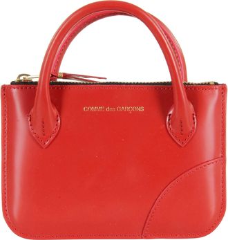 Comme Des Garçons Handles