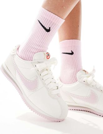 Nike Cortez - Sneakers in pelle bianco sporco e rosa