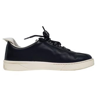 Chanel Chanel CC Trekkoord Lage Sneakers in Zwart Leer