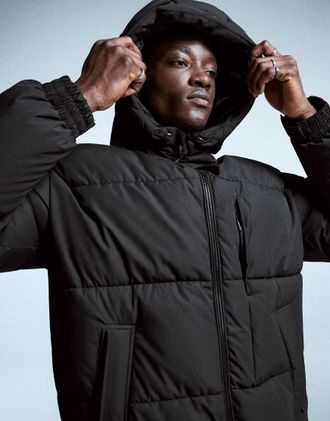 Bershka Piumino taglio lungo nero