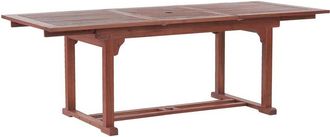Beliani Beliani - Mesa de comedor para exterior en madera de acacia oscura 160 x 220 x 90 cm con tapa extensible Toscana