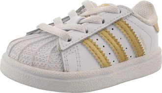 adidas Originals Baby Superstar I Running Shoe, White/Gold Metallic/Blue, 6 M US Infant