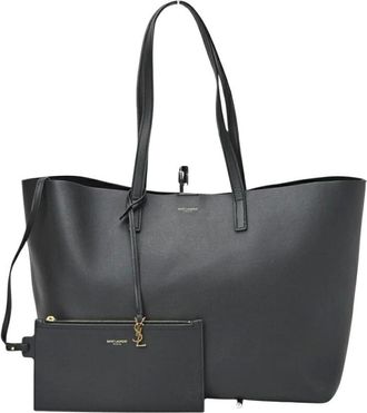 Saint Laurent Pre-owned Tote Bags, female, Black, Size: ONE SIZE Pre-owned Shopping Tote Medium Leather Tote