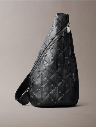 Calvin Klein Mens Debossed Allover Emblem Logo Sling Bag - Black