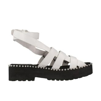 Yellow Schoenen, Dames, Wit, 38 EU, Leer, Stijlvolle platte sandalen van varkensleer