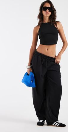 adidas Originals pantaloni barrel leg soft touch neri-Nero