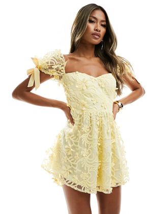 Love Triangle lace romper with tie back in yellow