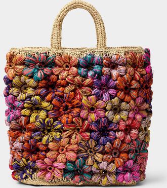 Simons Womens Embossed flower straw tote bag