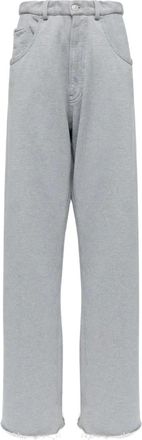 Maison Margiela Pantaloni con orlo a taglio vivo - Grigio