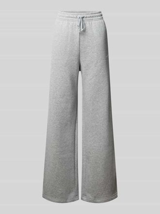 Nike Loose Fit Sweatpants mit Logo-Stitching Modell Phoenix in Hellgrau Melange, Gr&ouml;&szlig;e XL