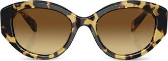 Swarovski Occhiali da sole cat-eye con decorazione - Marrone