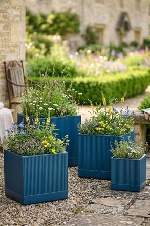 Dibor Set of 4 Navy Blue Ribbed Finish Fibre Clay Outdoor Garden Flower Planters | Size: Large