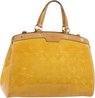 Louis Vuitton Pre-owned Handbags, female, Yellow, Size: ONE SIZE Pre-owned Blair MM Hand Bag