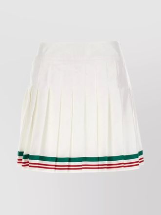 Casablanca high-waisted pleated mini skirt with striped hem