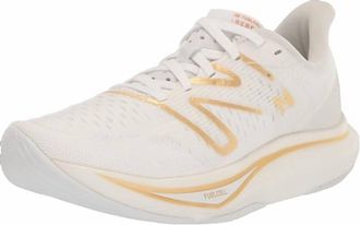 New Balance Womens Fuelcell Rebel V3 Running Shoes In White/gold Metallic/light Gold Metallic