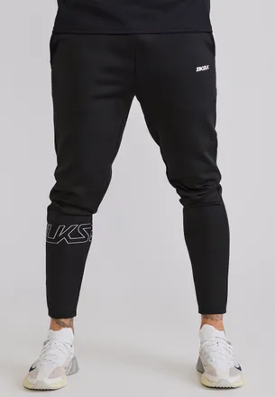 Siksilk Pantalones de ch&aacute;ndal din&aacute;micos negros para hombre XXL