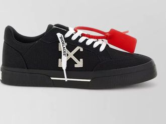 Off-white canvas low-top sneakers