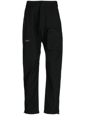 ISO.POETISM zip-pocket cotton trousers - men - Nylon/Cotton/Cotton - L - Black