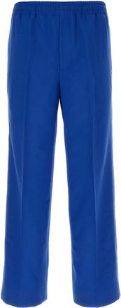 Gucci Cream coloured wool crêpe trousers from $1,108.40 - on