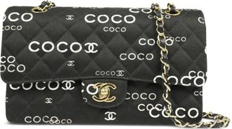 Chanel 2002 Coco-Print Double Flap shoulder bag - women - Canvas - One Size - Black