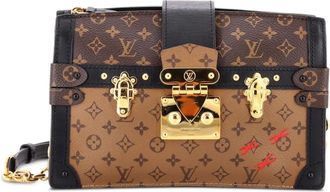 Louis Vuitton Trunk Reverse canvas clutch met monogram - Bruin