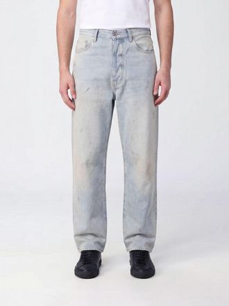 Amiri Jeans wide leg in denim di cotone con effetto usurato e vita media