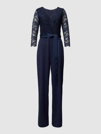Swing Jumpsuit mit Spitzenbesatz in Marine, Größe 36