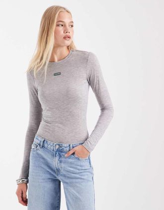Lacoste top in jersey a maniche lunghe con dettaglio etichetta grigio