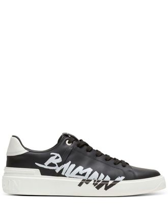 Balmain logo-print lace-up sneakers - men - Bos Taurus/Rubber - 40 - Black