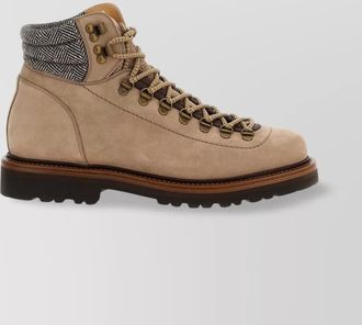 Brunello Cucinelli alpine ankle boots featuring metal eyelets