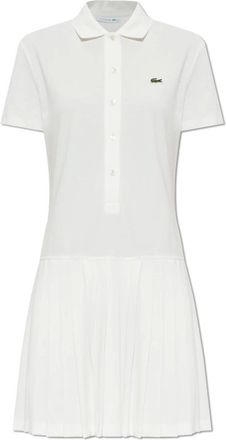 Lacoste Abito Polo in Piqu&eacute; Elasticizzato con Gonna a Pieghe - - Dresses - Donna - Bianco - M