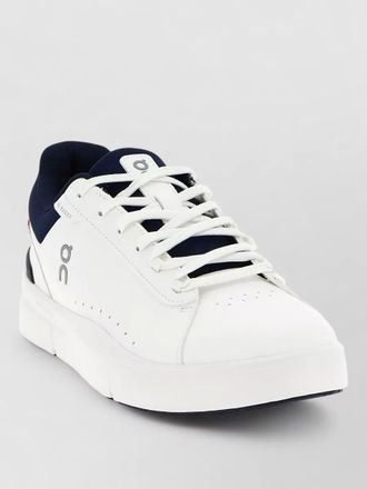 On artificial leather low-top sneakers