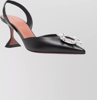 Amina Muaddi leather slingback pumps featuring sculptural heel